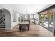 Open kitchen with wooden table and chairs with access to outside dining area via large sliding glass doors at 2282 E Zion Way, Chandler, AZ 85249