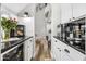 Kitchen counter with beverage cooler and arched doorway at 2282 E Zion Way, Chandler, AZ 85249