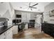 Spacious home office with hardwood floors, modern decor, multiple workstations and large windows at 2282 E Zion Way, Chandler, AZ 85249