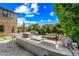 Great outdoor kitchen and dining area with built-in grill and ample counter space at 2282 E Zion Way, Chandler, AZ 85249