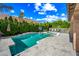 Backyard pool features a basketball hoop, patio, and lounge seating at 2282 E Zion Way, Chandler, AZ 85249
