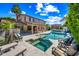 Stunning outdoor pool and spa featuring lounge seating and lush landscaping at 2282 E Zion Way, Chandler, AZ 85249
