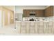 Modern kitchen with stainless steel appliances, bar-stool seating, ample cabinet space, and a stylish design at 23037 E Nightingale Rd, Queen Creek, AZ 85142