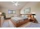 Bright bedroom featuring neutral tones, large bed, and sitting area at 2313 S Grandview Ave, Tempe, AZ 85282