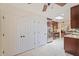 Bright kitchen with stainless appliances, tile floors, and a skylight providing natural light at 2313 S Grandview Ave, Tempe, AZ 85282