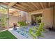Charming covered patio featuring cozy seating area with a swing and stylish decor at 2313 S Grandview Ave, Tempe, AZ 85282