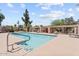 Community pool with inviting blue water and lounge area with a seating area at 2313 S Grandview Ave, Tempe, AZ 85282
