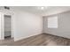 This bedroom boasts new vinyl flooring, a closet, and a window for natural light at 2333 W Glenrosa W Ave # 113, Phoenix, AZ 85015