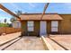 Single-story home showcasing mature trees and an attractive covered entry at 2333 W Glenrosa W Ave # 113, Phoenix, AZ 85015