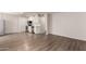 Open layout showcases kitchen with stainless steel appliances and white cabinets flowing into living area at 2333 W Glenrosa W Ave # 113, Phoenix, AZ 85015