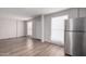Bright kitchen showcasing stainless steel refrigerator and ample counter space at 2333 W Glenrosa W Ave # 113, Phoenix, AZ 85015