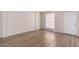 Cozy living room with wood-look floors, bright and airy, freshly painted at 2333 W Glenrosa W Ave # 113, Phoenix, AZ 85015