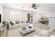 Bright, open-concept living area with modern furnishings and plenty of natural light at 23772 W Grove St, Buckeye, AZ 85326