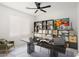 Home office complete with a work space, neutral colored walls, and a ceiling fan at 23772 W Grove St, Buckeye, AZ 85326