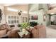 Comfortable living room with large windows, plush seating, and stylish decor at 25806 W Hilton Ave, Buckeye, AZ 85326