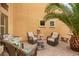 Private brick patio with ample seating perfect for relaxing in the desert sun at 25806 W Hilton Ave, Buckeye, AZ 85326