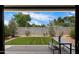 Well-maintained backyard with artificial grass, a bench, and privacy fencing at 2604 N 27Th St # 4, Phoenix, AZ 85008