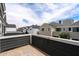 Balcony overlooking neighboring townhomes, offering outdoor living space at 2604 N 27Th St # 4, Phoenix, AZ 85008