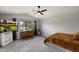 Bright bedroom with a golf course view, vaulted ceiling, and modern ceiling fan at 2604 N 27Th St # 4, Phoenix, AZ 85008