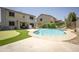 A refreshing pool and putting green enhance this home's beautiful backyard space at 29110 N 24Th Ln, Phoenix, AZ 85085
