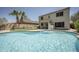 Gorgeous backyard features a sparkling pool, putting green, and inviting patio at 29110 N 24Th Ln, Phoenix, AZ 85085