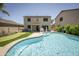 Backyard features a refreshing pool and putting green, enhancing outdoor appeal at 29110 N 24Th Ln, Phoenix, AZ 85085