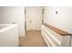 Upstairs hallway with built in shelving at 29110 N 24Th Ln, Phoenix, AZ 85085