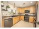 Updated kitchen with stainless steel appliances, granite countertops, and ample natural light at 29110 N 24Th Ln, Phoenix, AZ 85085