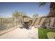 Private backyard patio features outdoor seating and a custom putting green at 29110 N 24Th Ln, Phoenix, AZ 85085