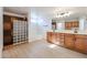 Bathroom boasting wood cabinets, dual vanities, a shower and bathtub at 29270 W Weldon Ave, Buckeye, AZ 85396