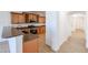 Kitchen featuring wood cabinets, granite countertops, and stainless steel appliances at 29270 W Weldon Ave, Buckeye, AZ 85396