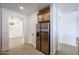 Kitchen features stainless steel refrigerator and wood cabinets at 29270 W Weldon Ave, Buckeye, AZ 85396