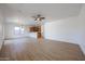 Open-concept living room flows into kitchen and dining area, perfect for entertaining at 29270 W Weldon Ave, Buckeye, AZ 85396