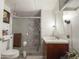 Well-lit bathroom with vanity, mirror, and stylish tiled shower at 2929 E Main St # 471, Mesa, AZ 85213