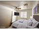 Comfortable bedroom featuring a ceiling fan, tv, and ample natural light at 2929 E Main St # 471, Mesa, AZ 85213