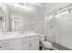 Bright bathroom features a glass enclosed shower, modern vanity and fixtures at 2947 N Sonoran Hls, Mesa, AZ 85207
