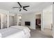Bedroom with ceiling fan, ensuite bathroom, and walk-in closet at 2947 N Sonoran Hls, Mesa, AZ 85207