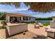 Spacious backyard with patio, outdoor seating, built-in BBQ, and artificial turf at 3030 E Camellia Dr, Gilbert, AZ 85296