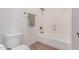 Clean bathroom featuring a toilet and a bathtub with tile flooring at 3030 E Camellia Dr, Gilbert, AZ 85296