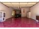 Spacious garage with ample parking and storage space, featuring a golf cart at 3030 E Camellia Dr, Gilbert, AZ 85296