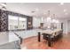 Gourmet kitchen with marble countertops, stainless steel appliances, and custom wallpaper at 3030 E Camellia Dr, Gilbert, AZ 85296