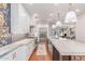 Modern kitchen featuring stainless steel appliances, large island, and pendant lighting at 3030 E Camellia Dr, Gilbert, AZ 85296