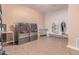 Spacious laundry room features modern washer and dryer units plus ample shelving at 3030 E Camellia Dr, Gilbert, AZ 85296