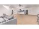 Open concept living room showcases a seamless flow into the kitchen, creating a spacious and inviting area at 3030 E Camellia Dr, Gilbert, AZ 85296