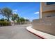 Gated Community Entrance featuring mature landscaping, signage and secured access at 3113 E Danbury Rd # 10, Phoenix, AZ 85032