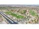 Wide aerial view showing the community with golf course at 3467 N Hooper St, Buckeye, AZ 85396