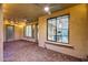 Spacious back patio provides views to the kitchen and backyard, and features ceiling fans at 3467 N Hooper St, Buckeye, AZ 85396