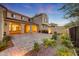 Beautiful backyard featuring a covered patio and desert landscaping, perfect for outdoor relaxation at 3467 N Hooper St, Buckeye, AZ 85396