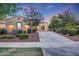 Inviting home exterior with mature trees and desert landscaping creating curb appeal at 3467 N Hooper St, Buckeye, AZ 85396