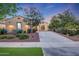 Charming home featuring a well-manicured lawn and professionally landscaped front yard at 3467 N Hooper St, Buckeye, AZ 85396
